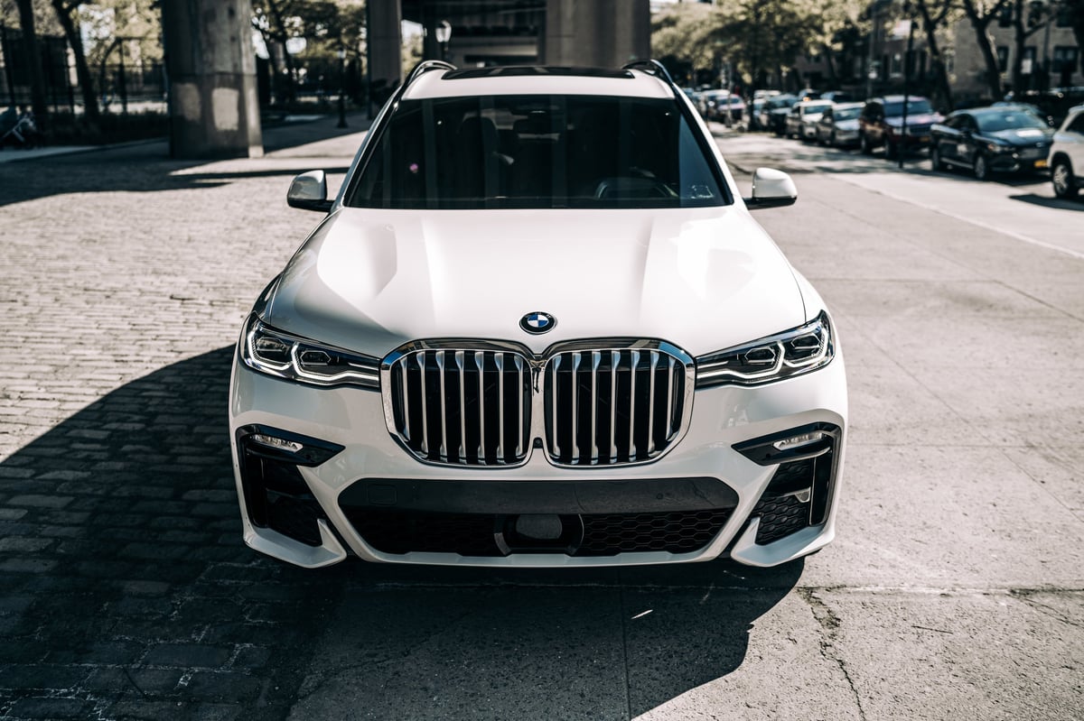 BMW X7 detailed to a showroom finish in bright sunlight